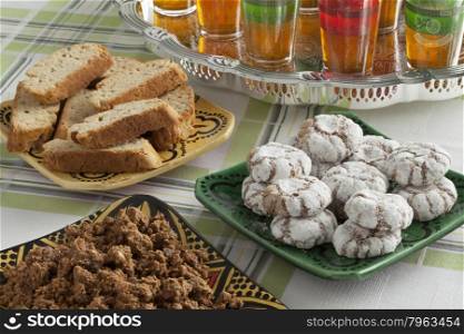 Traditional Moroccan homemade cookies and sellou with tea