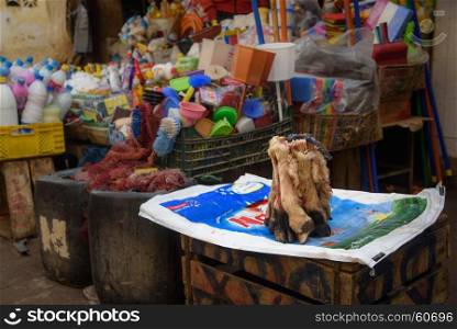 Traditional Moroccan market (souk) in Fez, Morocco. Goat legs on traditional Moroccan market (souk) in Fez, Morocco