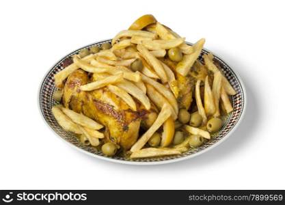 Traditional moroccan stuffed chicken with french fries on white background