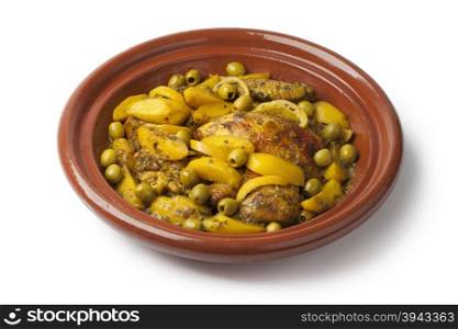 Traditional moroccan tajine with chicken,potatoes and olives on white background