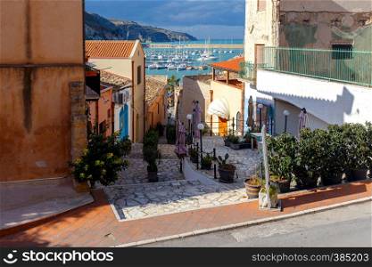 Traditional narrow medieval street in Castellammare del Golfo. Italy. Sicily.. Italy. Sicily. Castellammare del Golfo.