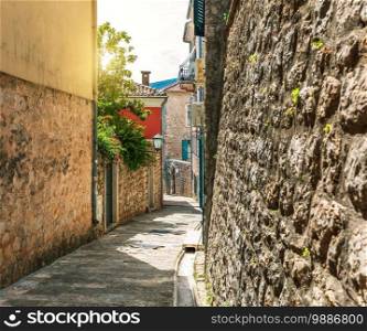 Traditional narrow street in Europe, Old Town of Herceg Novi, Montenegro.
