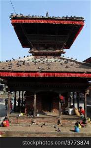 Traditional pagoda and doves on the Durbar square in Kathmandu, Nepal