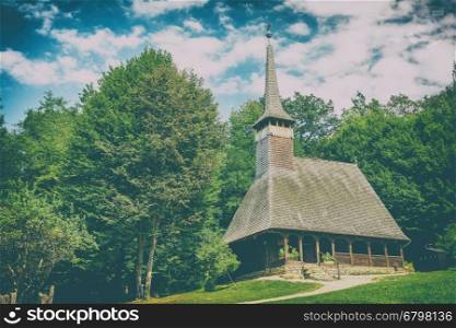 Traditional Romanian Wooden Church In Forest