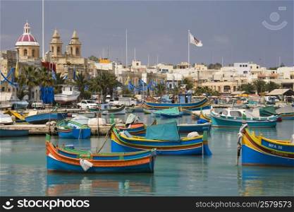 Traditional &rsquo;Luzzu&rsquo; fishing boats in Marsaxlokk Harbour on the island of Malta