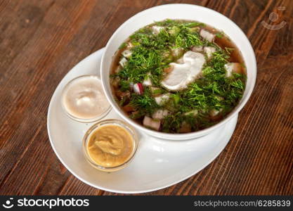 Traditional Russian kvass soup with vegetables - okroshka