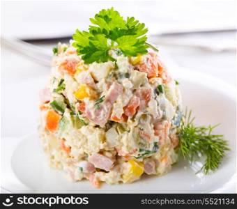 traditional russian salad on a plate