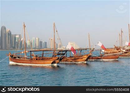 Traditional sailing dhows lined up in Doha Bay, Qatar, to mark Qatar&rsquo;s national day