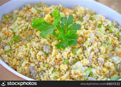 Traditional Thanksgiving side dish of crumbled cornbread, celery, onion and sausage