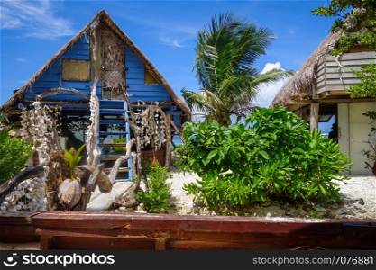 Traditional tropical hut the beach in Moorea Island. French Polynesia. Traditional tropical hut the beach in Moorea Island