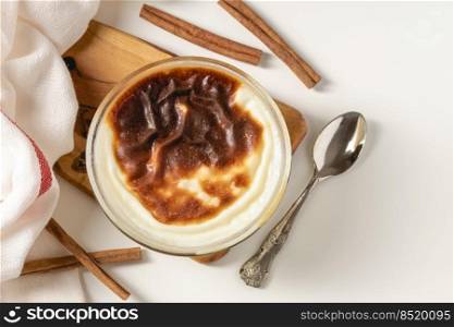 Traditional turkish dessert bakery rice pudding Turkish name F r n Sutlac in glass bowl