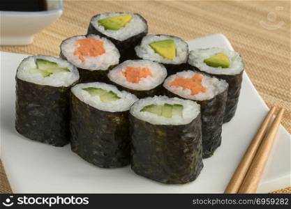 Traditional variety of Japanese vegetable sushi maki on a dish. Traditional Japanese vegetable sushi maki