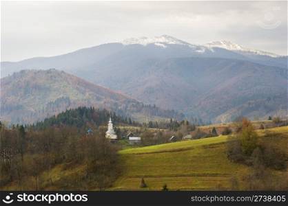 Traditional village in Carpathian mountains in autumn. Ukraine