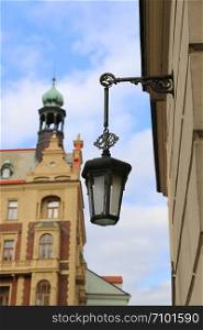 Traditional vintage street lamp and architecture of beautiful Prague, Czech Republic