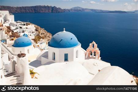traditional white architecture over the Caldera, Aegean sea. Scenic travel background, Santorini
