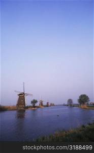 Traditional windmill along a pond, Amsterdam, Netherlands