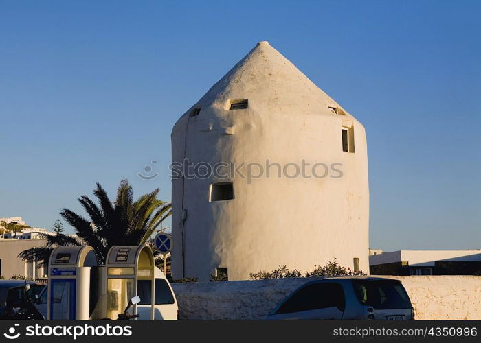 Traditional windmill in a town, Mykonos, Cyclades Islands, Greece