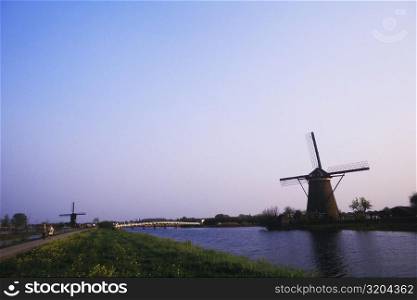Traditional windmill near a pond, Amsterdam, Netherlands