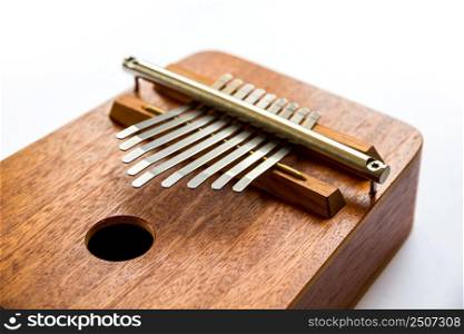 Traditional wooden kalimba isolated on white background. Traditional wooden kalimba isolated on white