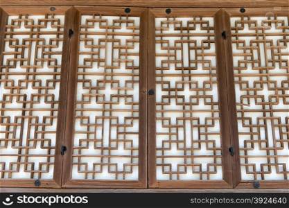 Traditional wooden paper door pattern in Asia. Background pattern of a traditional wooden paper door in Korea