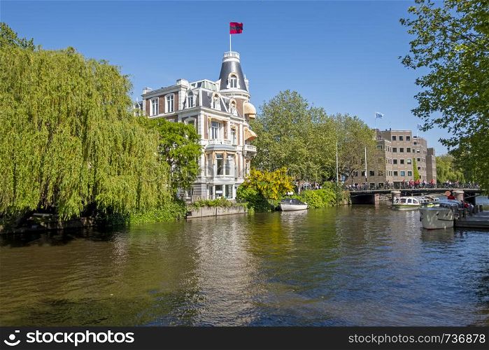 Traditonal dutch houses along the canal in Amsterdam the Netherlands