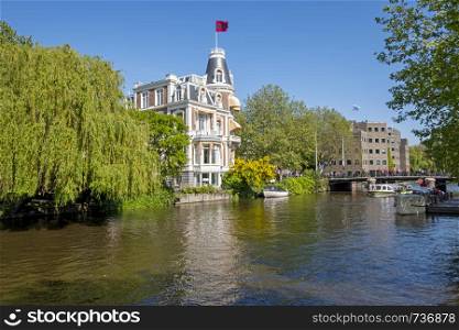 Traditonal dutch houses along the canal in Amsterdam the Netherlands