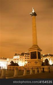Trafalgar square at night London UK