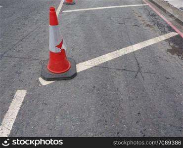 traffic cone to mark road works or temporary obstruction traffic sign. traffic cone sign