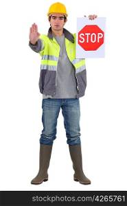 Traffic guard directing traffic