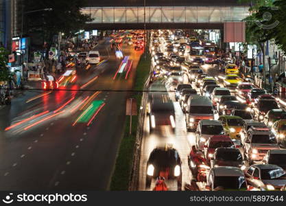 Traffic jam at the night street in megalopolis