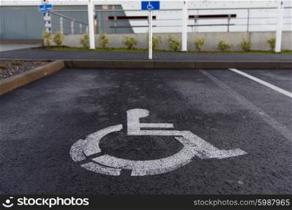 traffic laws and highway code concept - car parking road sign for disabled outdoors. car parking road sign for disabled outdoors