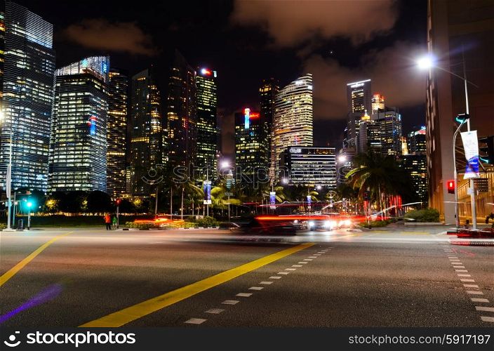 traffic lights at night in Singapore downtown. traffic lights