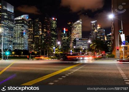 traffic lights at night in Singapore downtown. traffic lights