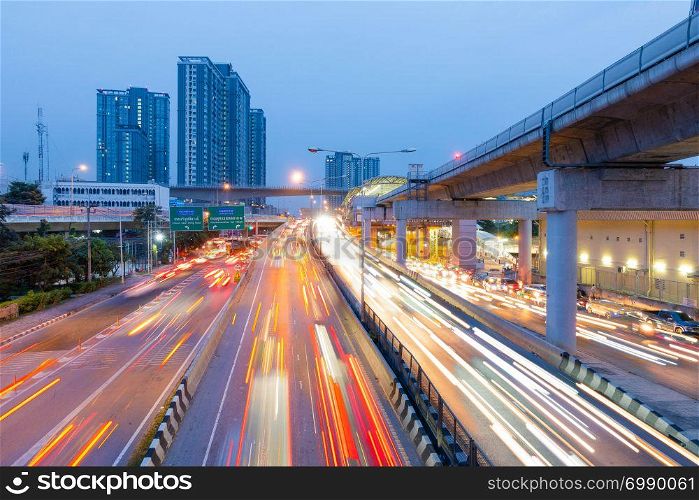 Traffic lights from cars On the road and bridge In Bangkok