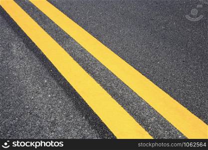 Traffic line on road with texture background.
