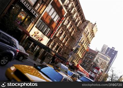 Traffic near buildings, New York City, New York State, USA