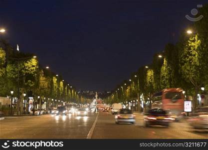 Traffic on a road at night, Paris, France