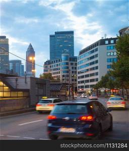 Traffic on a road in Downtown of Frankfurt, Germany. Motion blur