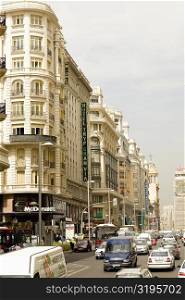 Traffic on a road in front of a hotel, TRYP Gran Via Hotel, Gran Via, Madrid, Spain