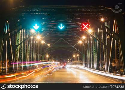 Traffic on the bridge at night. Car traffic on the bridge last night.