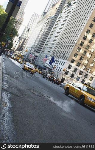 Traffic on the road in front of buildings