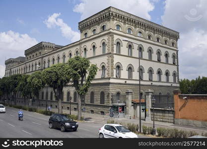 Traffic on the road, Palazzo Strozzi, Florence, Italy