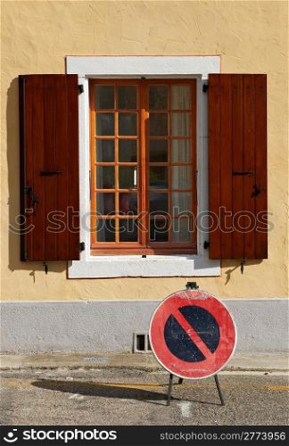 Traffic Sign Prohibiting Stopping near an Open Window in the Town of Saou, France