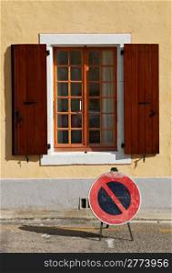 Traffic Sign Prohibiting Stopping near an Open Window in the Town of Saou, France