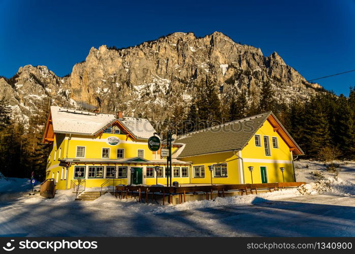 Tragos, Oberort Austria - 01.07.2020: Peaceful mountain at Gasthof Gruner See mountainhut shelter in Austria Styria. Tourist destination green lake.. Tragos, Oberort Austria - 01.07.2020: Peaceful mountain at Gasthof Gruner See mountainhut shelter in Austria Styria. Tourist destination green lake