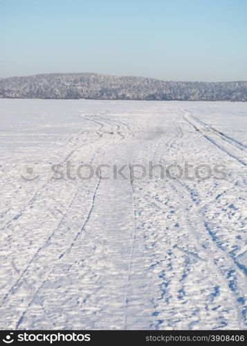 trails on the lake in winter