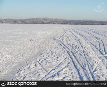 trails on the lake in winter