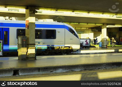 Train at a railroad station platform, Rome, Italy