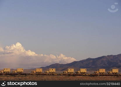 Train Carrying Army Trucks