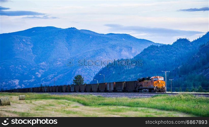 train moving through flathead reservation in montana mountains